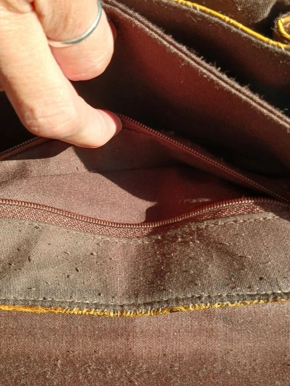 Relic Embossed Leather Crossbody Bag in Gold
